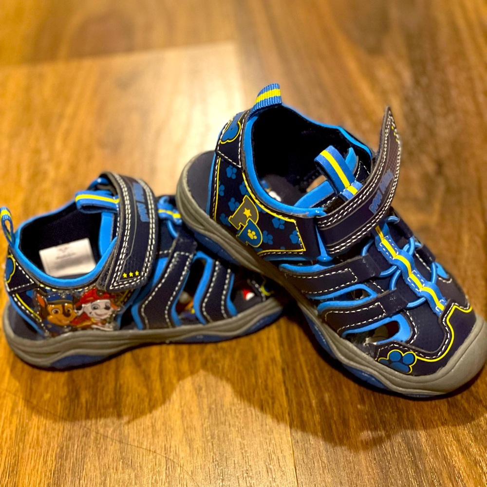 Paw Patrol Light Up Sandals. New without tags. Size 7T.